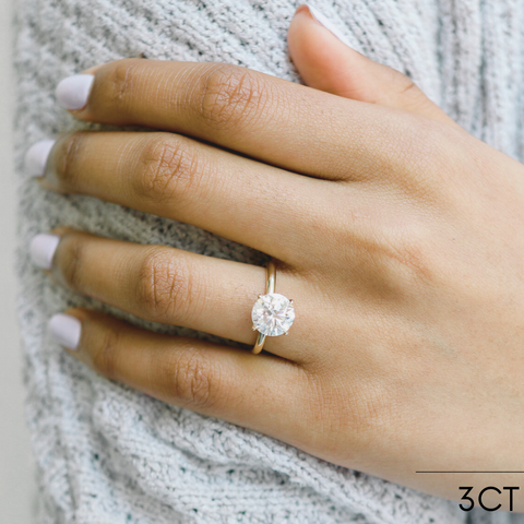 Round Solitaire with Hidden Halo