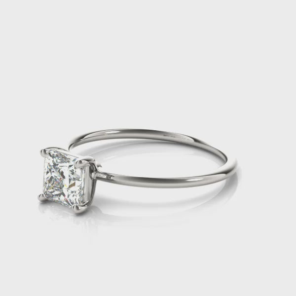 Sleek Princess Solitaire engagement ring on hand, video 1