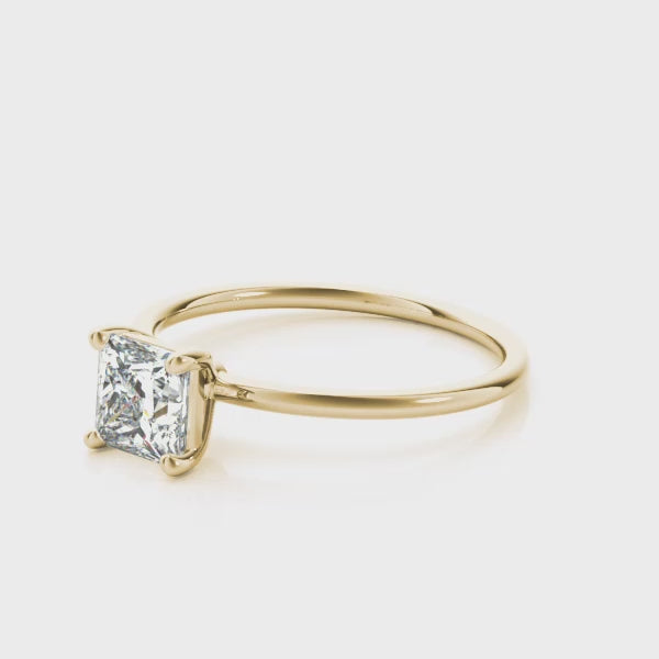 Sleek Princess Solitaire engagement ring on hand, video 2