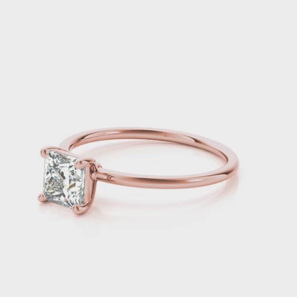 Sleek Princess Solitaire engagement ring on hand, video 3