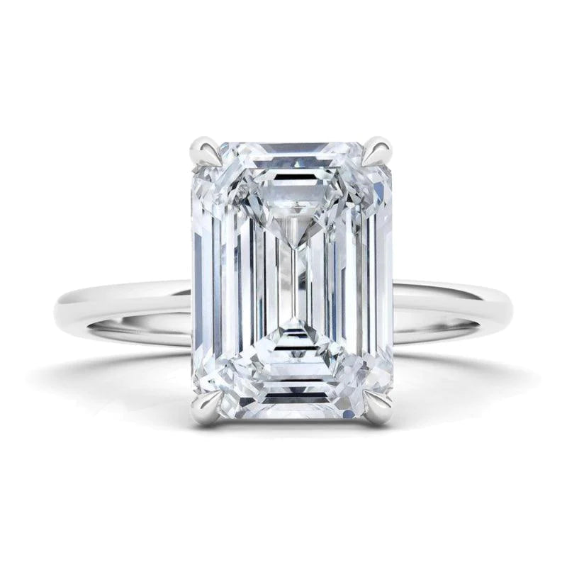 Sleek Emerald Solitaire